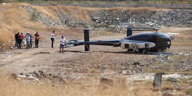 İzmir'de arızalanan helikopter boş araziye indiği sırada yan yattı