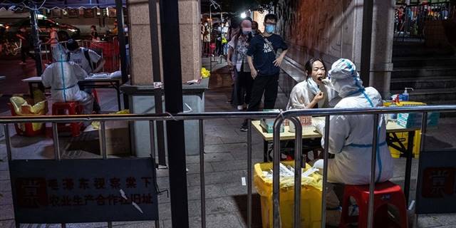 Çin, hastalık belirtisi göstermeyen Kovid-19 vakalarını bildirmeyecek