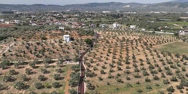 Büyükşehir'den çevre yerleşimlerde sathi kaplama atağı 14 ilçede 200 kilometrelik ova yolu düzenlendi