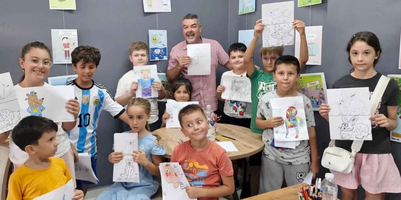 Ayvalık’ta minik sanatçılar karikatür atölyesinde buluştu